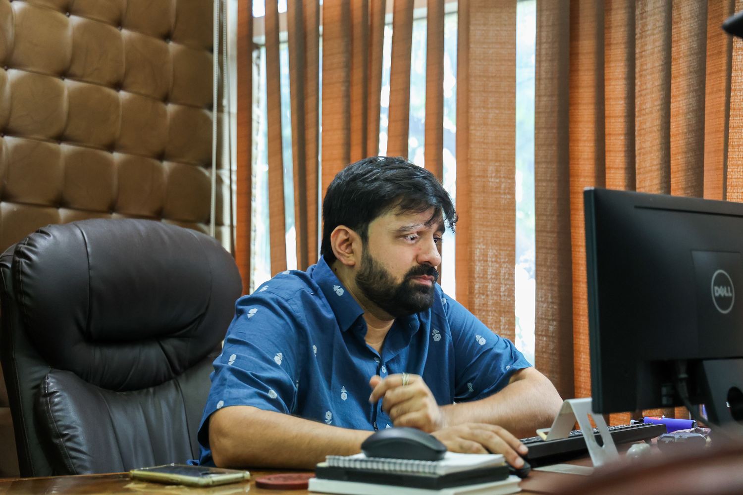 Sahil Sheth at his desk